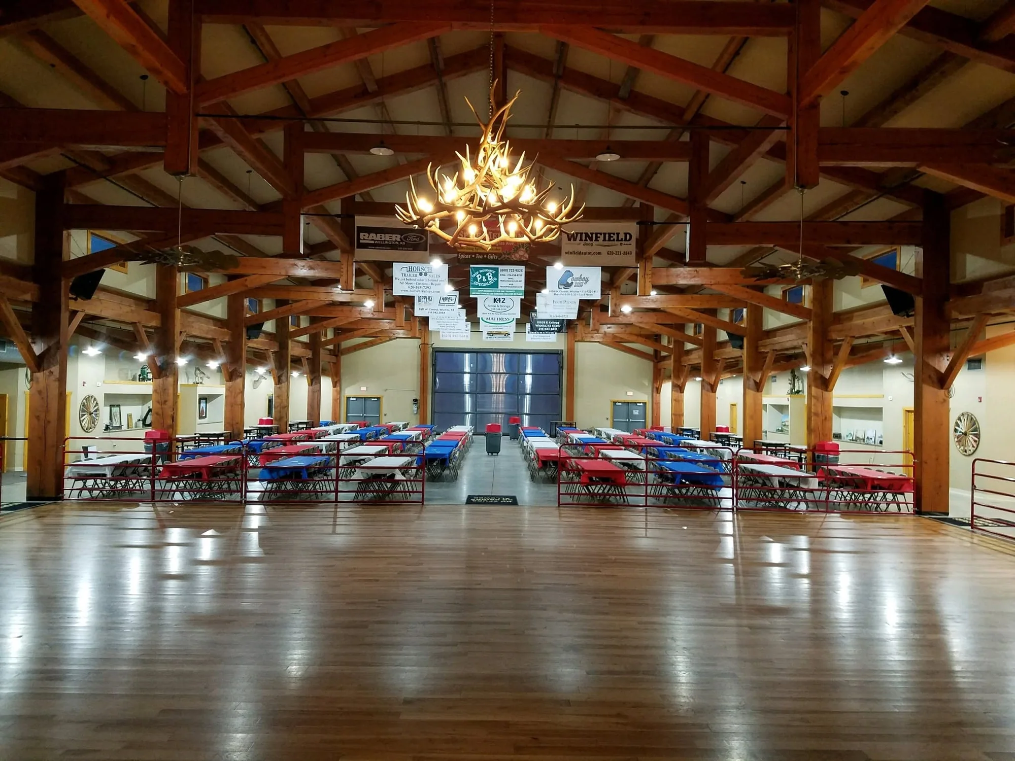 Timber-beamed interior and dance floor at Wichita Union Stockyards